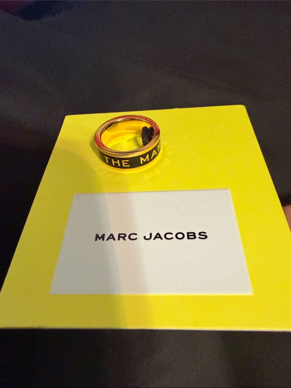Marc Jacobs Black and Gold Logo Band Ring